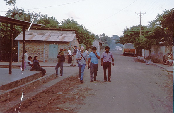 Kim Esterberg is guided through town on Ometepe Island in Nicaragua by its mayors Diego Martinez and Samuel Vialez during his first visit there more than 25 years ago.